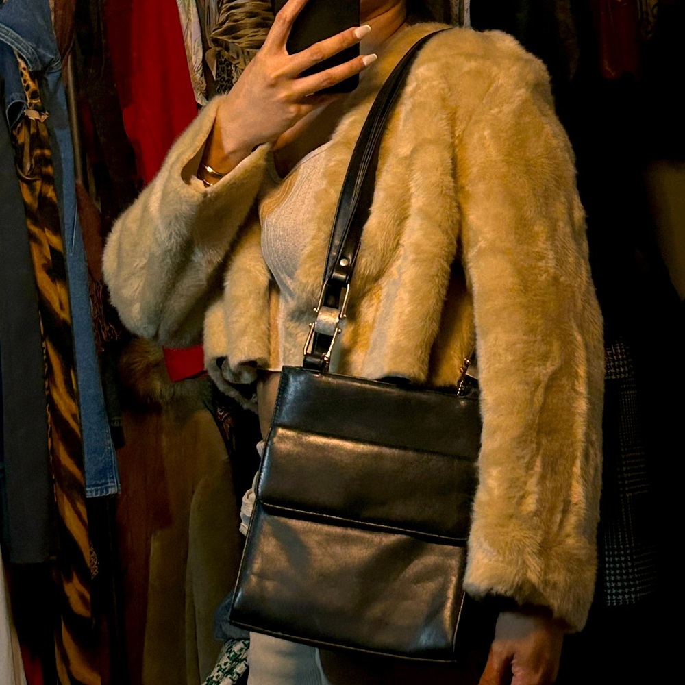 Minimalist black leather bag
